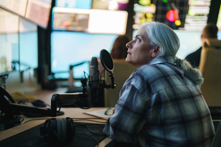 Anitra Ingalls (Chief Scientist and Professor, University of Washington) watches the Remotely Operated Vehicle screens in Mission Control on the ship during a dive.